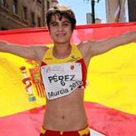 Women - 10 km Junior - Maria Perez celebrates the bronze medal