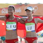 20 km women - Liu Hong and Lu Xiuzhi celebrates gold and bronze (by Giancarlo Colombo per Fidal)